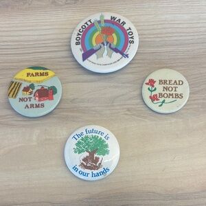 4 piece collection vintage anti-war buttons
